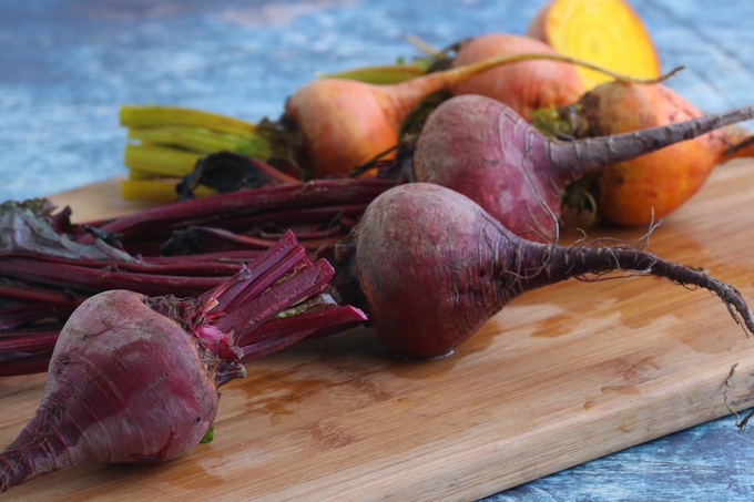 Picture of Red and Yellow Beetroots with some leaves attached