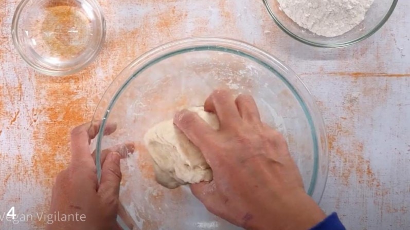 step 4 showing person kneading dough for bread