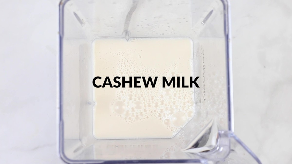 cashew milk added to blender to make acai smoothie bowl