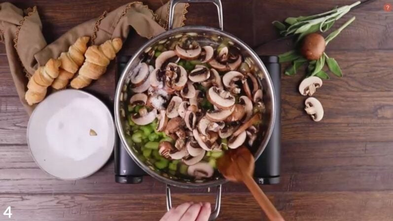 mushrooms and other vegetables simmering in skillet