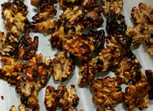closeup of walnuts toasted in sesame oil